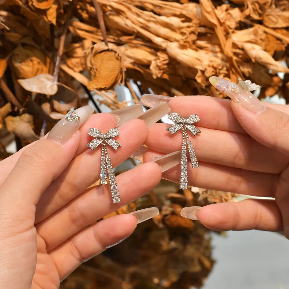 Sparkle Zirconia Bow Tassel Stud Earring 40200263 - image1