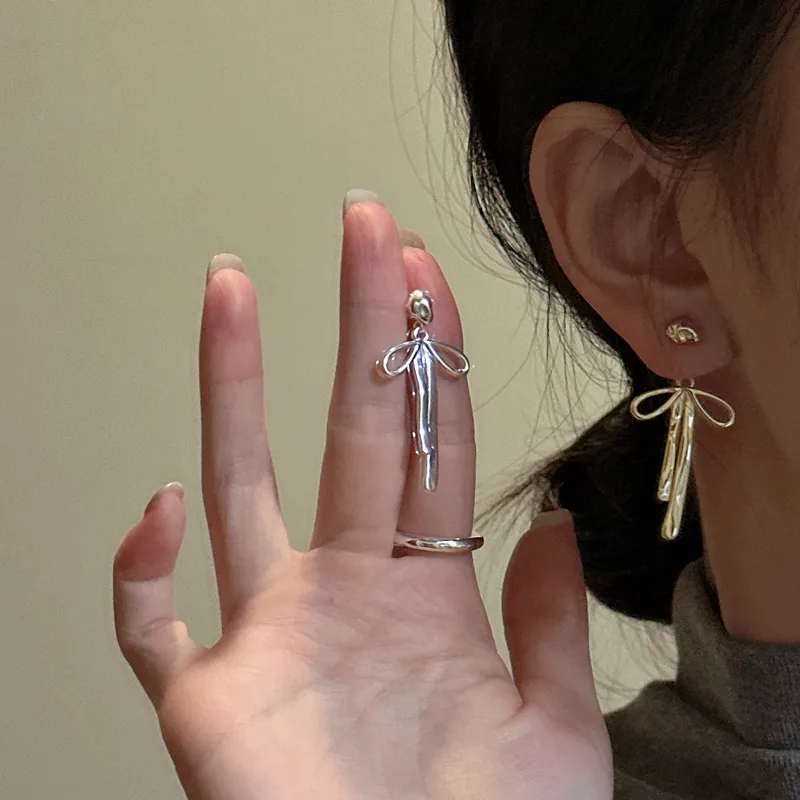 925 Sterling Silver Textured Bow Earring 40400128